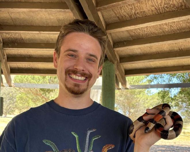 Owen Bachhuber, a Cal Poly biological sciences graduate student, is a co-manager of the &ldquo;Under the Snakefluence&rdquo; project. Credit: Photo by Megan Hendrickson