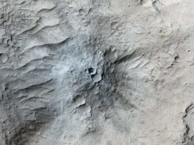 Captured by the HiRISE camera on NASA’s Mars Reconnaissance Orbiter on March 4, 2021, this impact crater was found in Cerberus Fossae, a seismically active region of the Red Planet. Scientists matched its appearance on the surface with a quake detected by NASA’s InSight lander. Credit: NASA/JPL-Caltech/University of Arizona