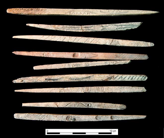 The 18,000-year-old discoveries from the Maszycka Cave include decorated hunting tools made of bone and antler. Credit: Darek Bobak