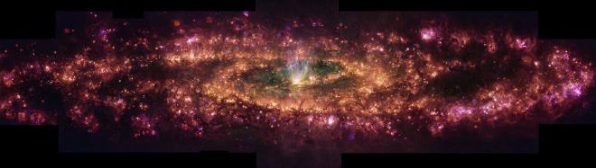 This image shows the Sculptor Galaxy in a new light. This false-colour composition shows specific wavelengths of light released by hydrogen, nitrogen, sulphur and oxygen. These elements exist in gas form all over the galaxy, but the mechanisms causing this gas to glow can vary throughout the galaxy. The pink light represents gas excited by the radiation of newborn stars, while the cone of whiter light at the centre is caused by an outflow of gas from the black hole at the galaxy’s core. Credit: ESO/E. Congiu et al.