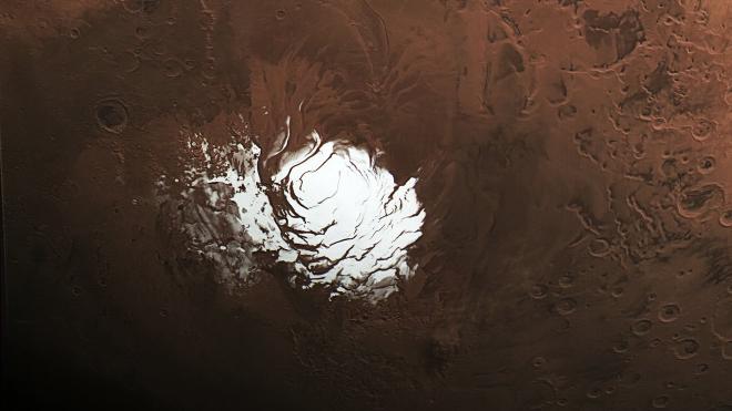 The European Space Agency’s Mars Express orbiter captured this view of Mars’ south polar ice cap Feb. 25, 2015. Three years later, the spacecraft detected a signal from the area to the right of the ice cap that scientists interpreted as an underground lake. Credit: ESA/DLR/FU Berlin, CC BY-SA 3.0 IGO