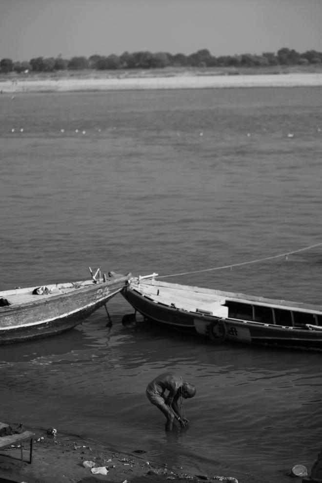 Man bending on the water